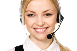 Cheerful professional call center operator, white background
